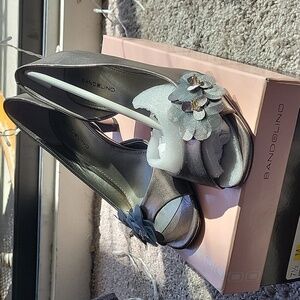 Gunmetal open toe heels with flower detail